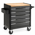 Chariot à outils en métal noir avec plateau en bois